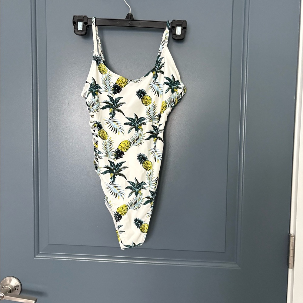 Revamped high cut Tropical pineapple Leaf Swimsuit. Cutouts on the side
